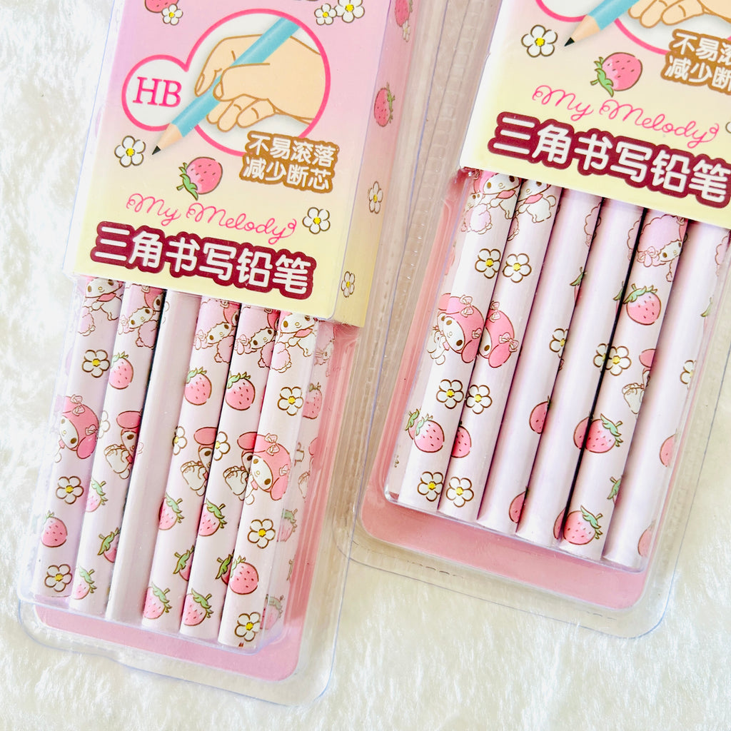 Two packages of pink strawberry-themed HB pencil erasers on a white textured background. The packages feature cute illustrations of a pink character with a strawberry hat, flowers, and strawberries, with Chinese text and 'My Melody' branding.