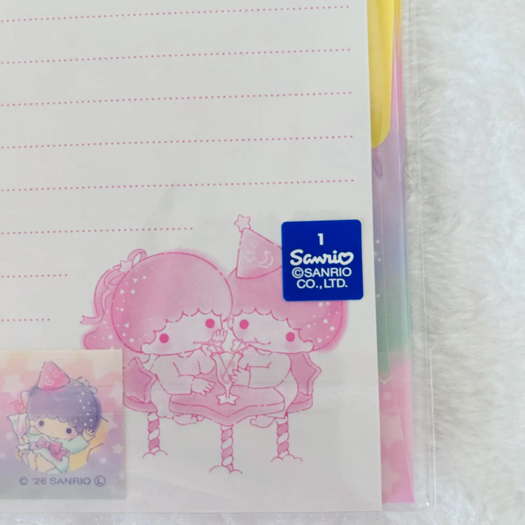 Sanrio Two-Little Stars themed lined notepad sheet with a blue Sanrio logo sticker and character illustration, photographed on a white textured surface.