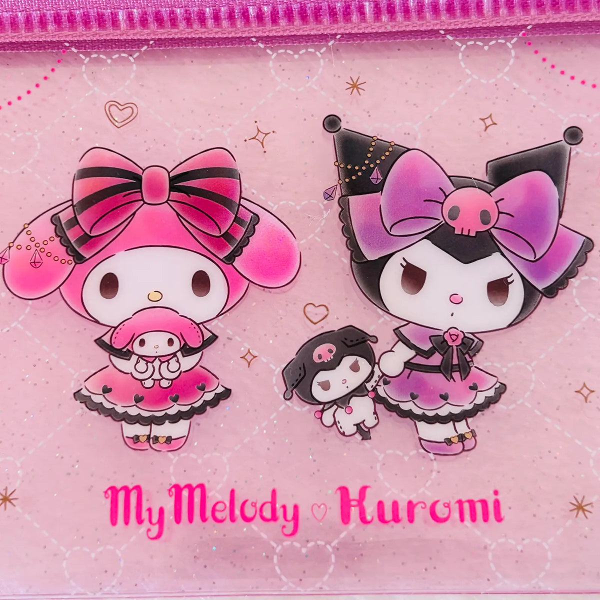 A pink My Melody and Kuromi themed zippered pouch or case, featuring printed cartoon characters and the text 'My Melody Kuromi' at the bottom.