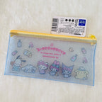 A translucent light blue zippered pencil case with Sanrio character prints, shown with its original retail tag on a white textured background.