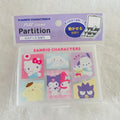 A Sanrio Characters Pill Case Partition in its original packaging, featuring cartoon characters like Hello Kitty, My Melody, and Kuromi on a white textured background.