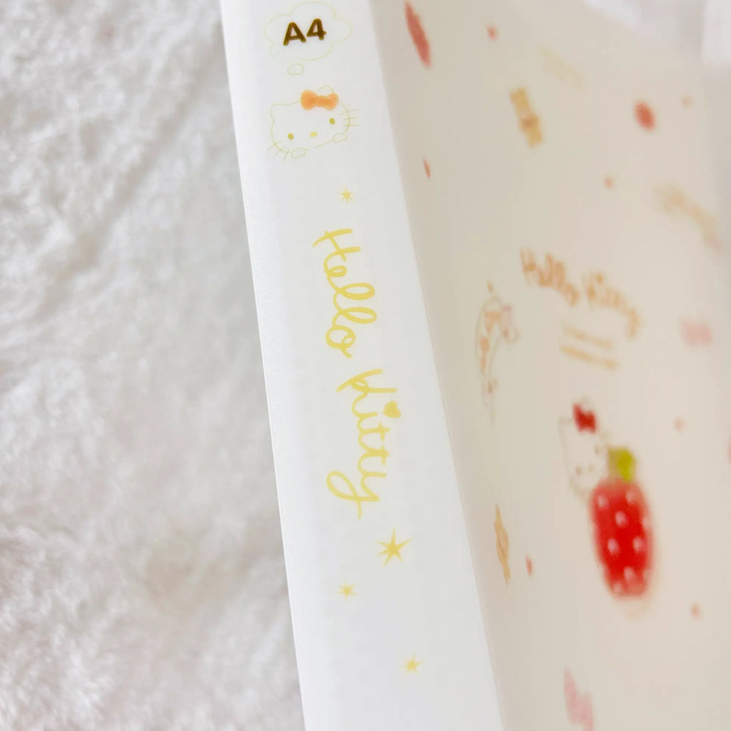 The spine of a clear book written in text of "Hello Kitty", "A4" and a illustration of a Hello Kitty's head.
