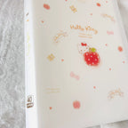 A translucent white plastic file folder featuring Hello Kitty designs, including a central apple illustration, 'Hello Kitty' text, small hearts, bows, and apples.