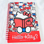A spiral-bound notebook featuring Hello Kitty illustrations, with a large central character graphic reading 'Hello Kitty?' and a red bottom band with copyright text for Sanrio.