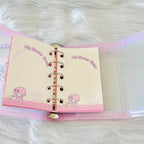 A pink binder with cream-colored pages featuring cute cartoon poodle illustrations and the text 'My Sweet Piano'.