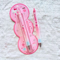 A pink Hello Kitty themed retractable pen set, featuring one pen in its pink blister packaging.