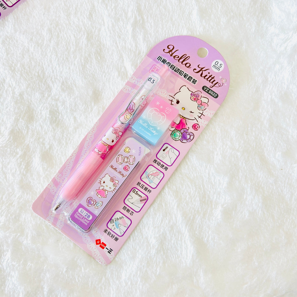 Hello Kitty 0.5mm mechanical pencil with an eraser in its original pink blister packaging, displayed on a white textured fabric background.