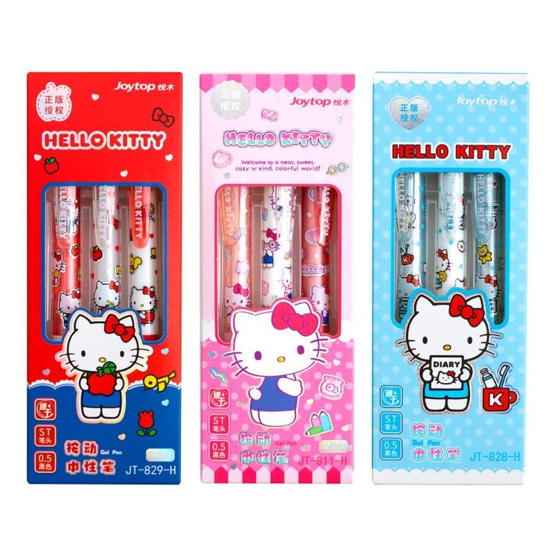 Three Joytop Hello Kitty gel pens in their retail packaging, shown side-by-side in red, pink, and blue boxes on a white background.