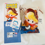A Disney Pixar Dimoo World collectible figure plush pendant product box. Opened from the bottom and shows a card of Sulley.