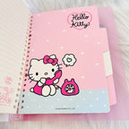 A opened pink Hello Kitty spiral-bound notebook, showing a page of divider with Hello Kitty illustration talking on a pink phone.