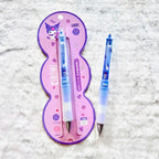 A blue and white Kuromi-themed retractable pen set, including one pen in its pink and purple blister packaging and one pen displayed outside the package.