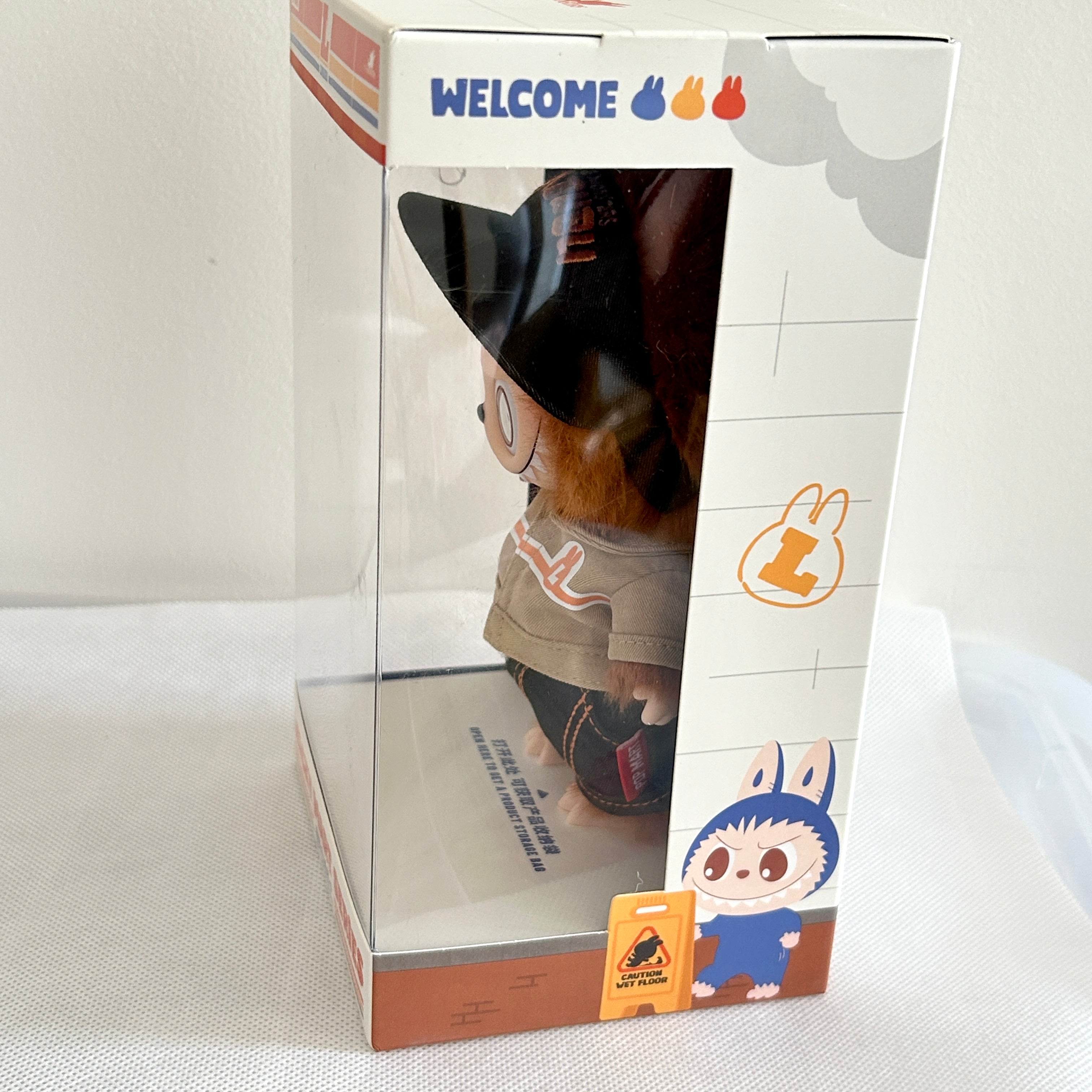 A Labubu Wacky Mart Series plush doll inside its original retail packaging.  