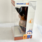 A Wacky Mart Series collectible plush figure inside its original retail packaging, displayed on a light-colored fabric surface.