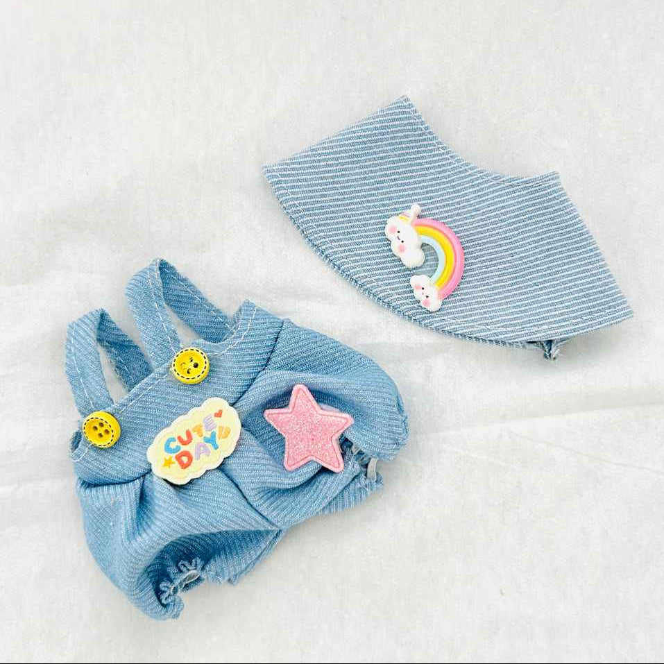 A Labubu plush doll outfit set including a blue denim overalls and a cap with rainbow patches, outfit front view. 	
