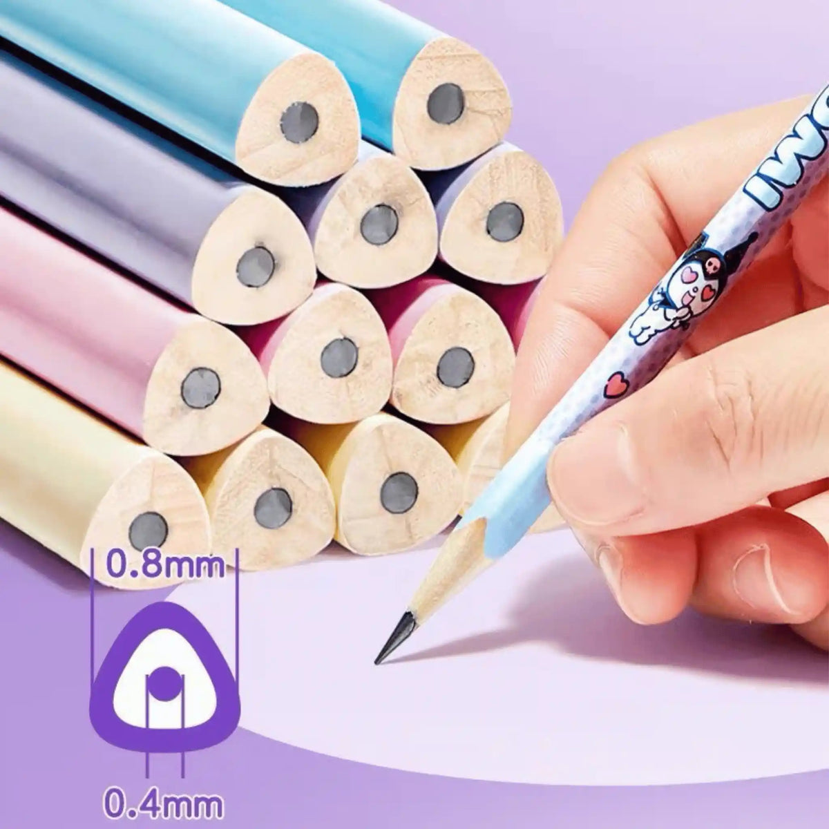 A close-up of a hand holding a blue pencil with cartoon graphics, writing on a white sheet.