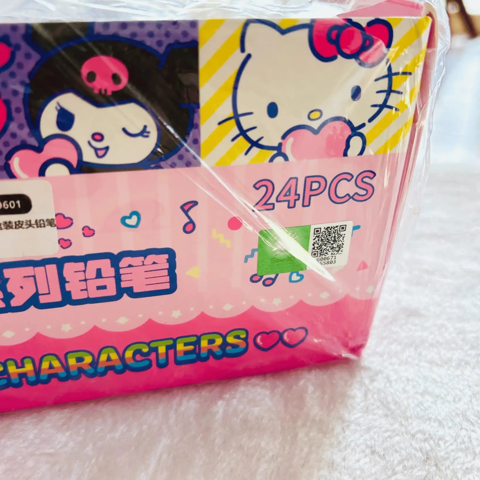 An outer box of the Sanrio Characters 12pc HB Pencils, box shows OR code with Hello Kitty head. 