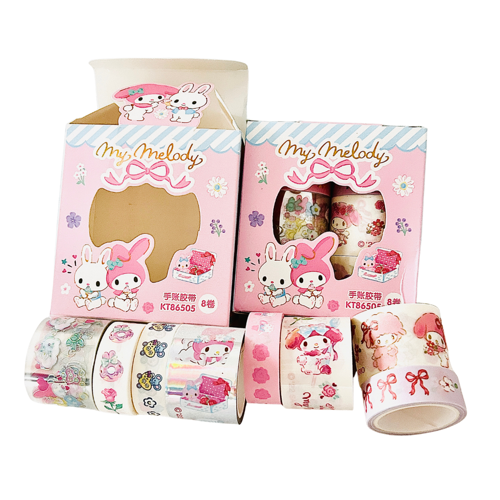 Pink My Melody washi tape rolls displayed with their retail packaging on a clean white background. The packaging features cute illustrations of My Melody and Sanrio characters, and the tape itself has various pastel patterns.