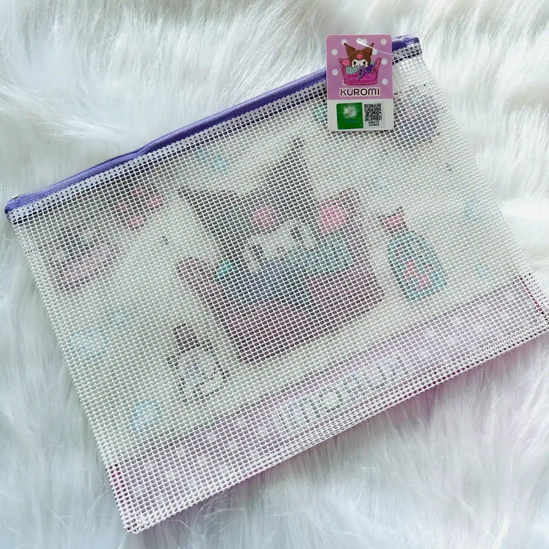 Back view of a mesh zippered pouch featuring a cute character illustration.