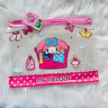 A Sanrio My Melody zippered pouch with a pink and white polka dot design, featuring an illustration of My Melody washing clothes.  