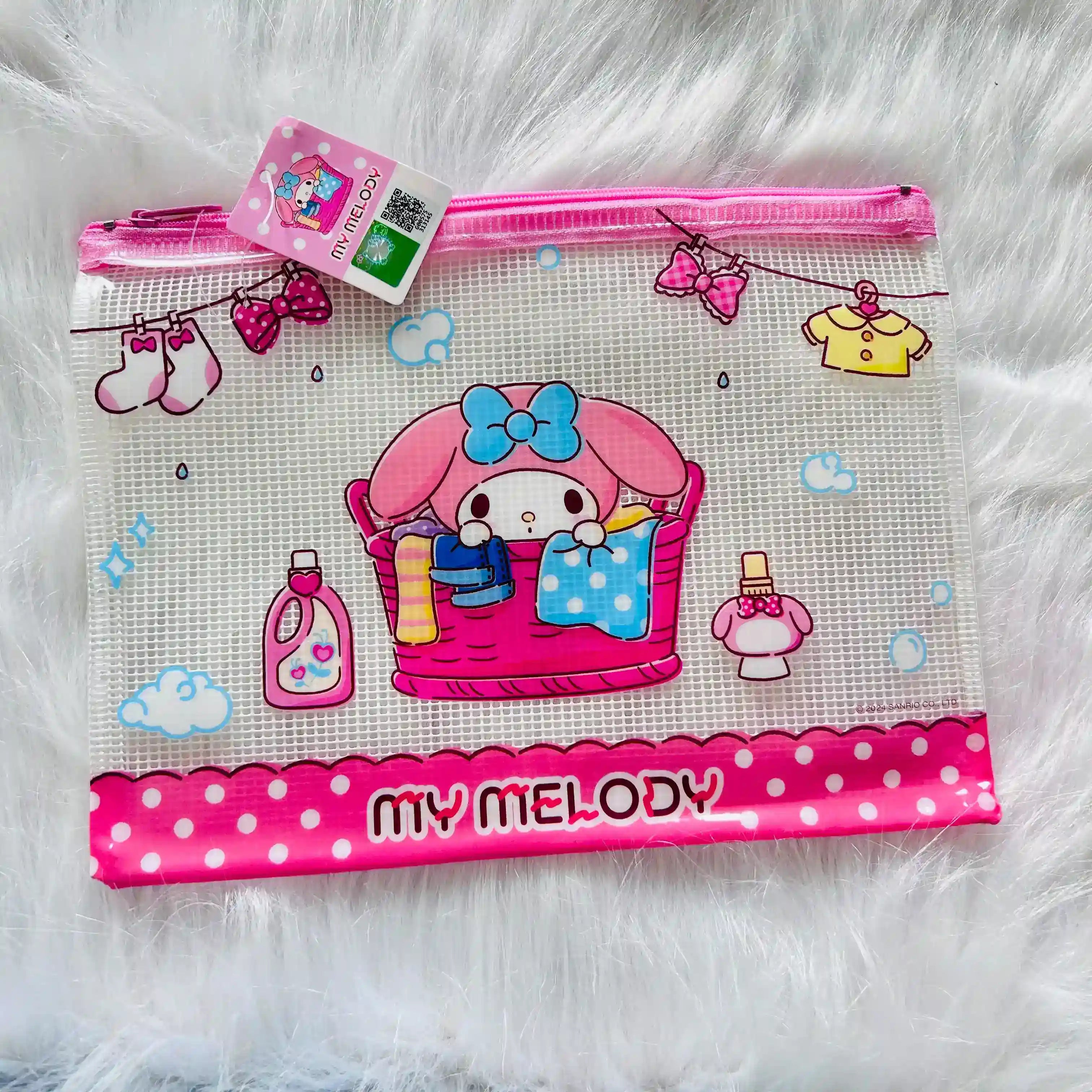 A Sanrio My Melody zippered pouch with a pink and white polka dot design, featuring an illustration of My Melody washing clothes.  