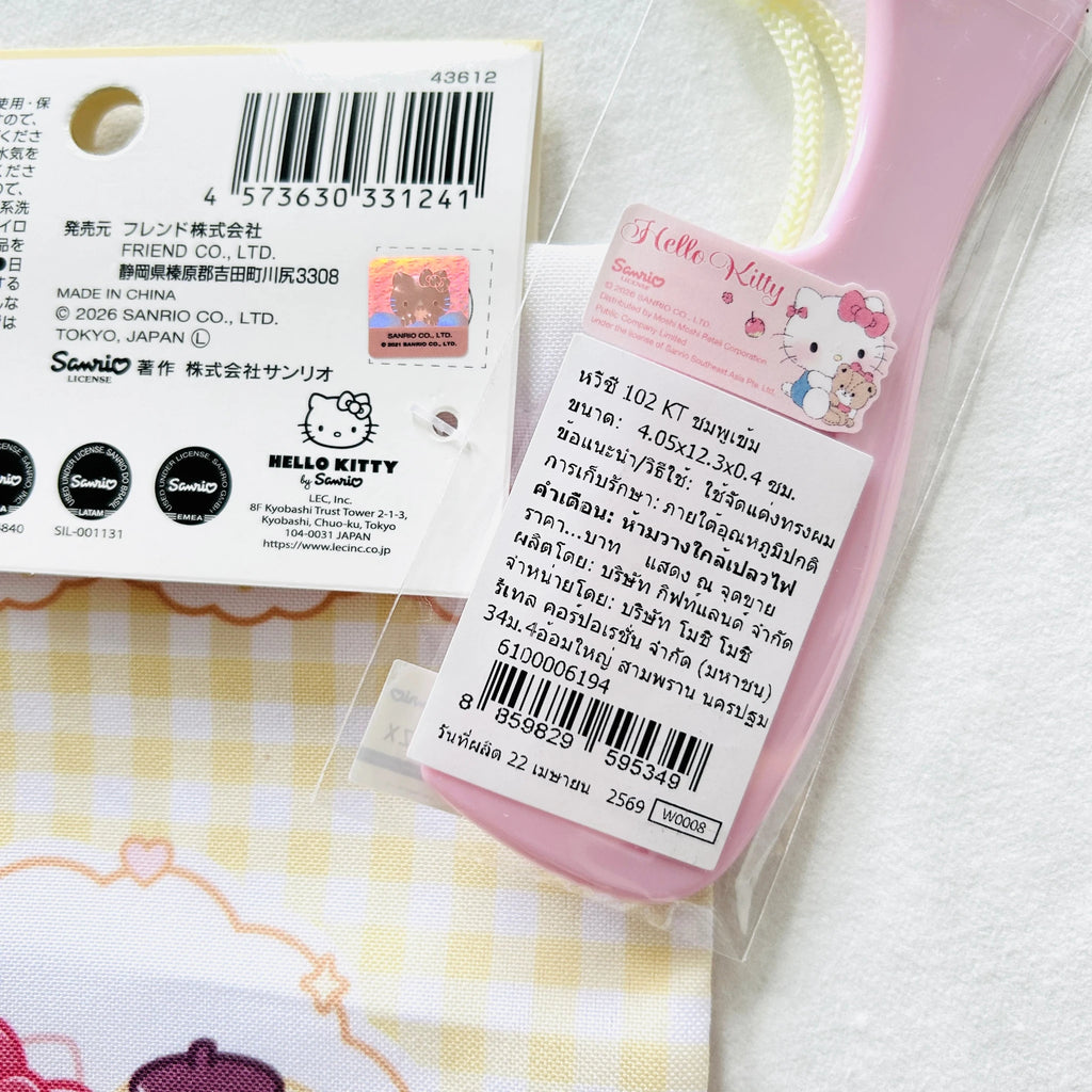 A Hello Kitty hair comb's product information in Thai, and the drawstring bag package shows certificate mark.