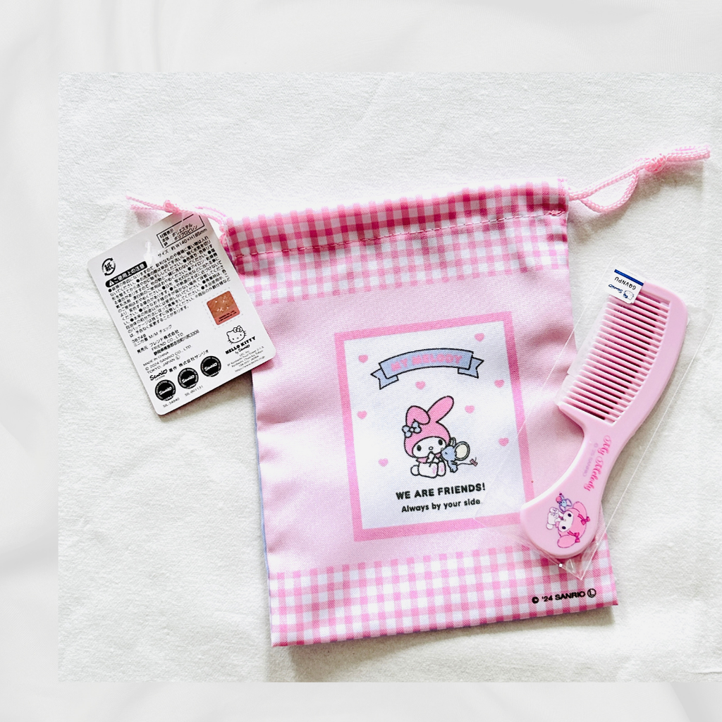 A My Melody drawstring pouch with a matching pink hair comb.