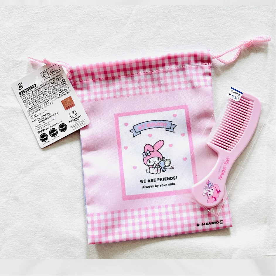 A My Melody drawstring pouch with a matching pink hair comb.