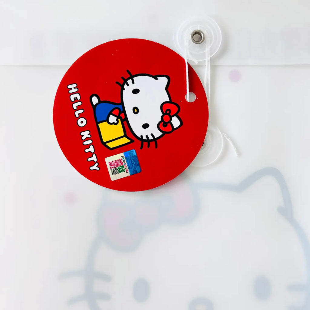 A round red Hello Kitty hangtag with a clear plastic hook, featuring the Hello Kitty character and 'HELLO KITTY' text on a white background.