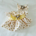 A Labubu doll yellow floral dress with white gingham bodice, and a matching bow headband with a rhinestone bow and pearl.