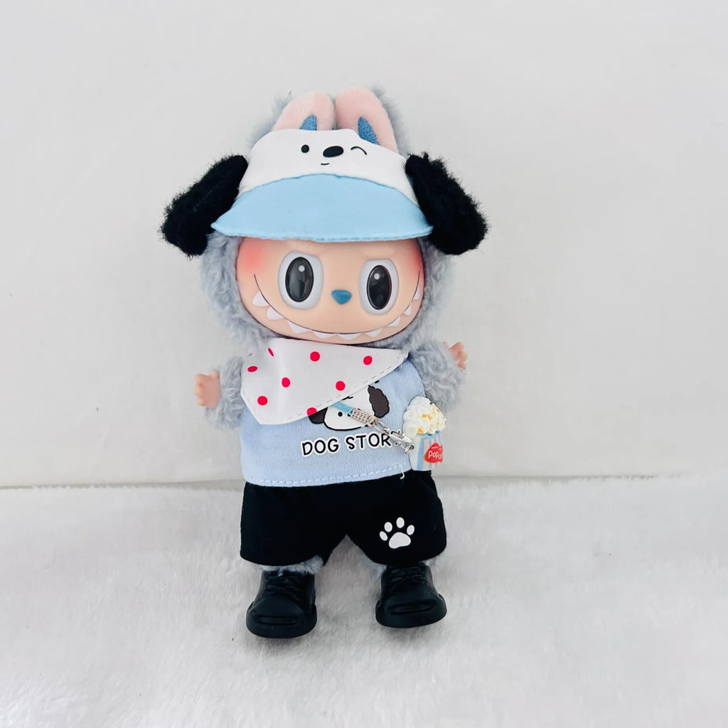 A Labubu doll wearing a light blue visor, a white bib with red polka dots, a light blue shirt with 'DOG STORE' text, black shorts, and black shoes.