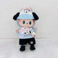 A Labubu doll wearing a light blue visor, a white bib with red polka dots, a light blue shirt with 'DOG STORE' text, black shorts, and black shoes.
