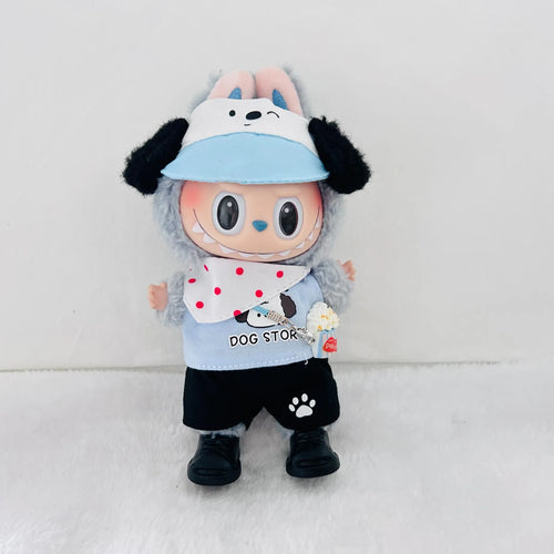 A Labubu doll wearing a light blue visor, a white bib with red polka dots, a light blue shirt with 'DOG STORE' text, black shorts, and black shoes.