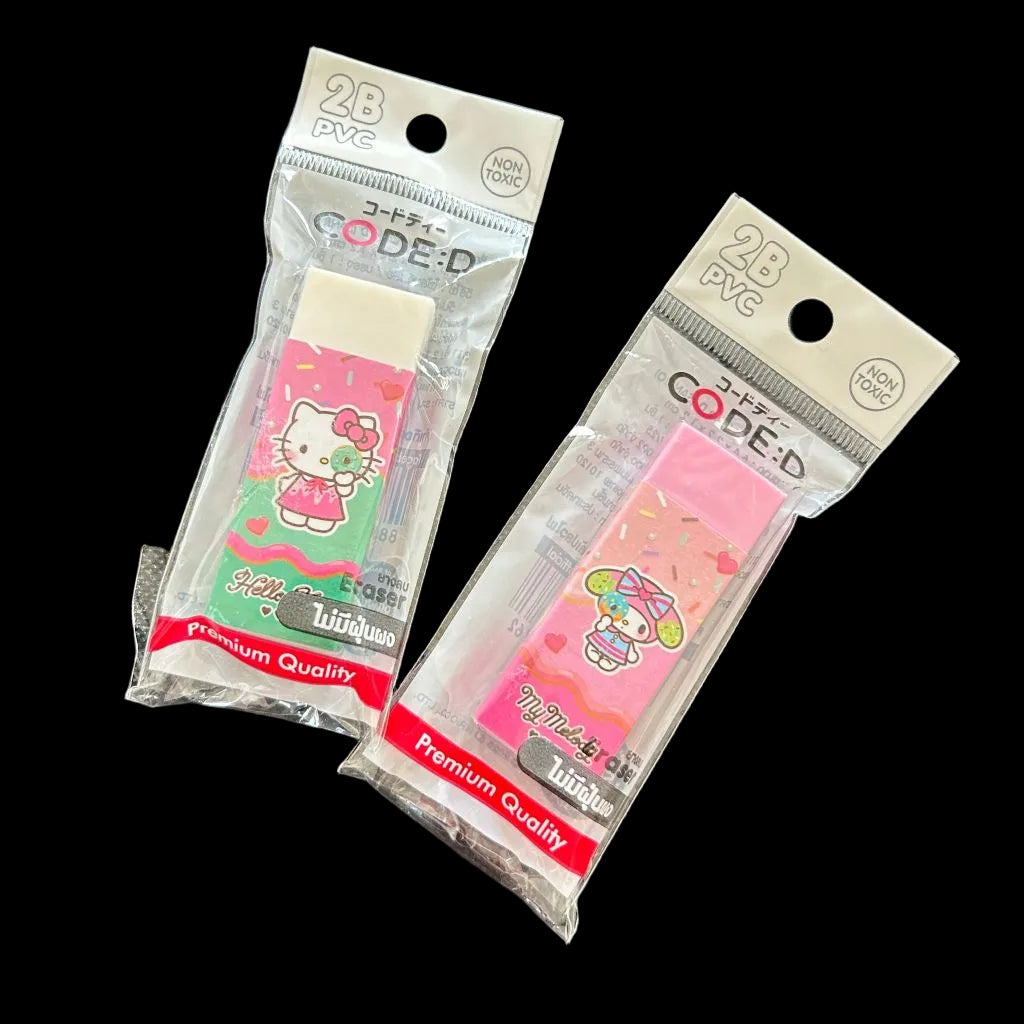 Two packaged PVC erasers featuring Hello Kitty and Sanrio characters, displayed on a dark textured background.