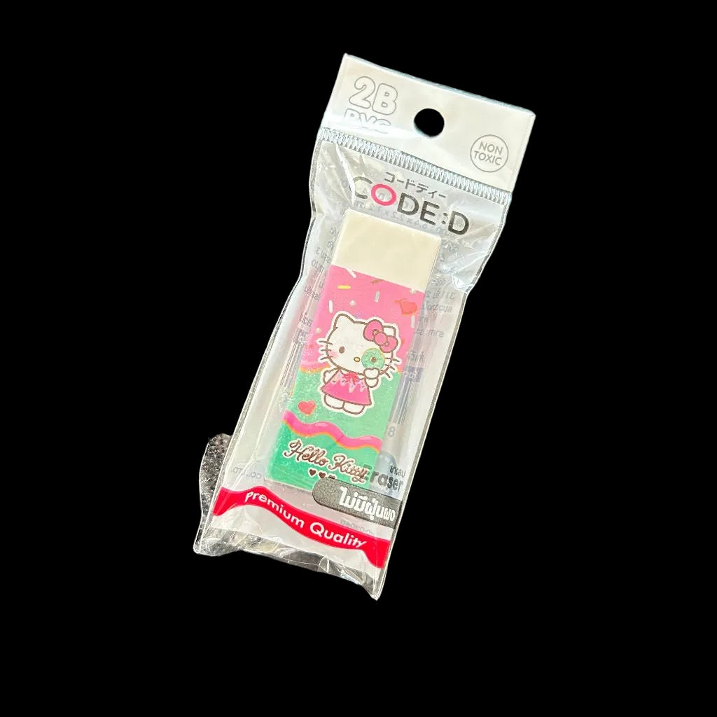 A packaged Hello Kitty rubbers packaged in a plastic bag, featuring a pink character design, text in CODE:D and Japaneseコードディー.