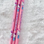 Three pink Hello Kitty pencils with cute character prints and polka dots.