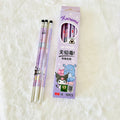 Three Kuromi-themed wooden pencils with a light purple pattern are displayed next to their original packaging box 
