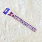 A Kuromi-themed purple color plastic ruler in its original retail packaging, with the iconic logo of Kuromi. Package shows the brand name of iiGen.  