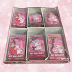 A pink My Melody collector's box containing multi individual packaged My Melody erasers. 