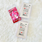 Three Sanrio My Melody erasers. One shows a pink My Melody character design, while the other two show the package back with product details.