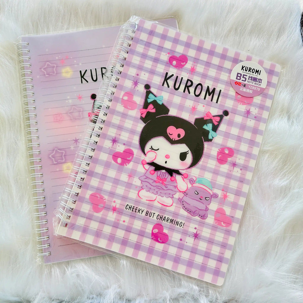 A Kuromi-themed spiral notebook with a pink and white gingham cover, featuring a Kuromi character illustration.