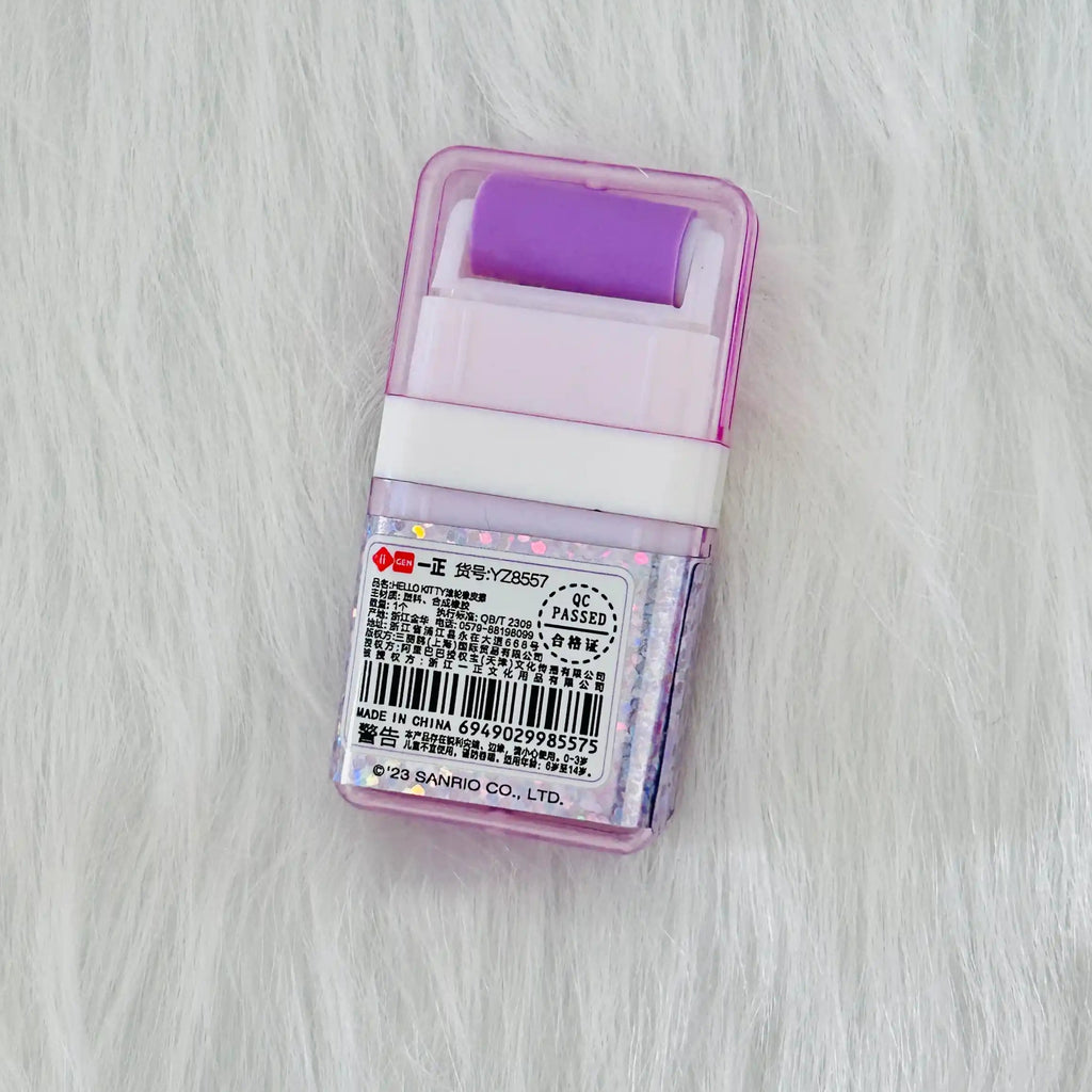 Back view of a purple Sanrio Hello Kitty Erasers with roller shavings collector, shows product details and barcode.