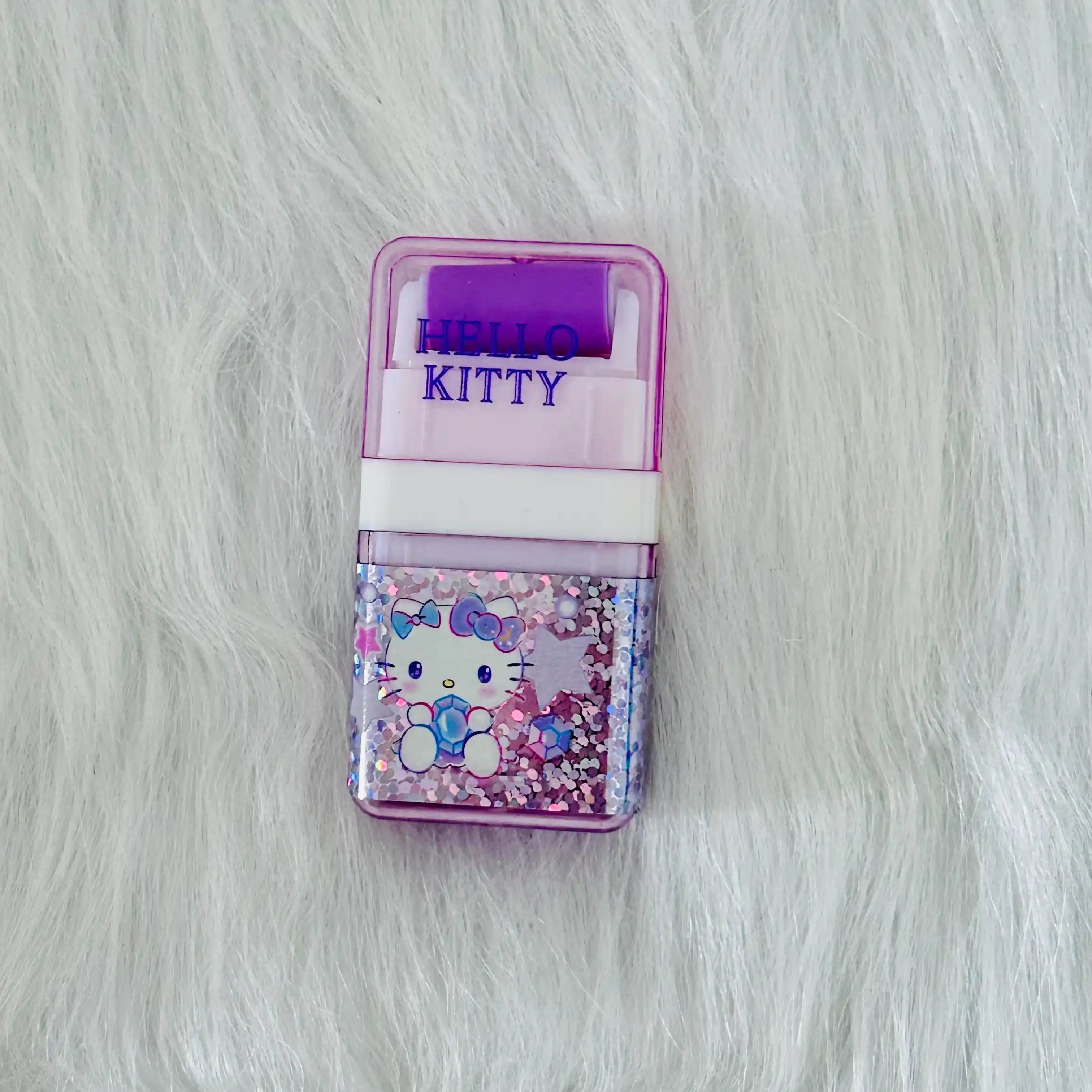 Front view of a purple Sanrio Hello Kitty Erasers with roller shavings collector, featuring a Hello Kitty illustration.