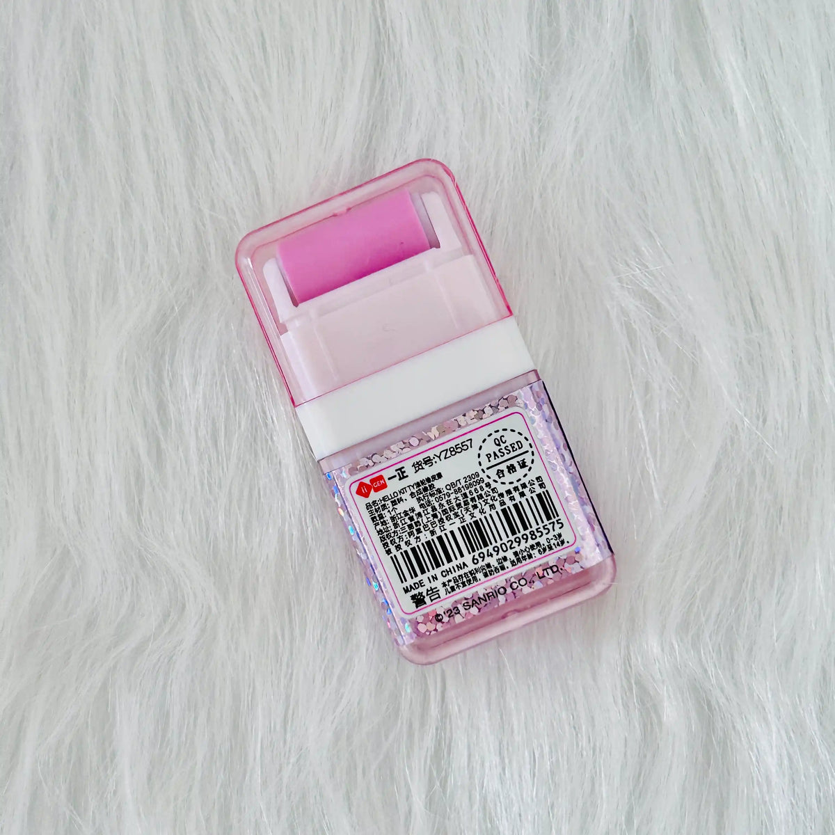 Back view of a pinkSanrio Hello Kitty Erasers with roller shavings collector.