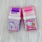 Two Sanrio Hello Kitty Erasers with roller shavings collector, one in purple and another in pink colour.