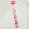 A pink My Melody plastic ruler in its clear plastic packaging, featuring cute illustrations of cakes, hearts, and stars.