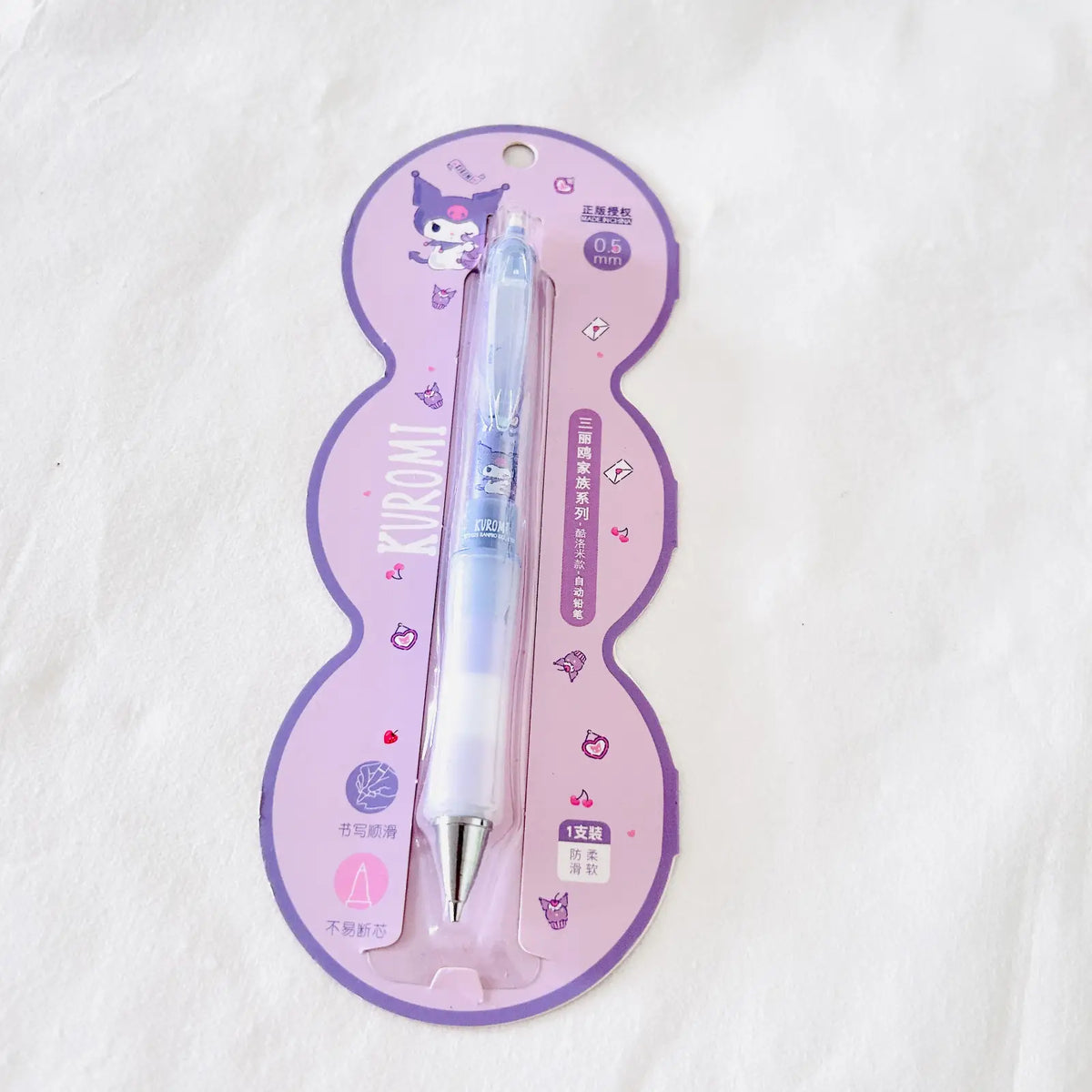 A blue and white Kuromi-themed retractable mechanical pencil set, including one pen in its pink and purple blister packaging and one pen displayed outside the package.