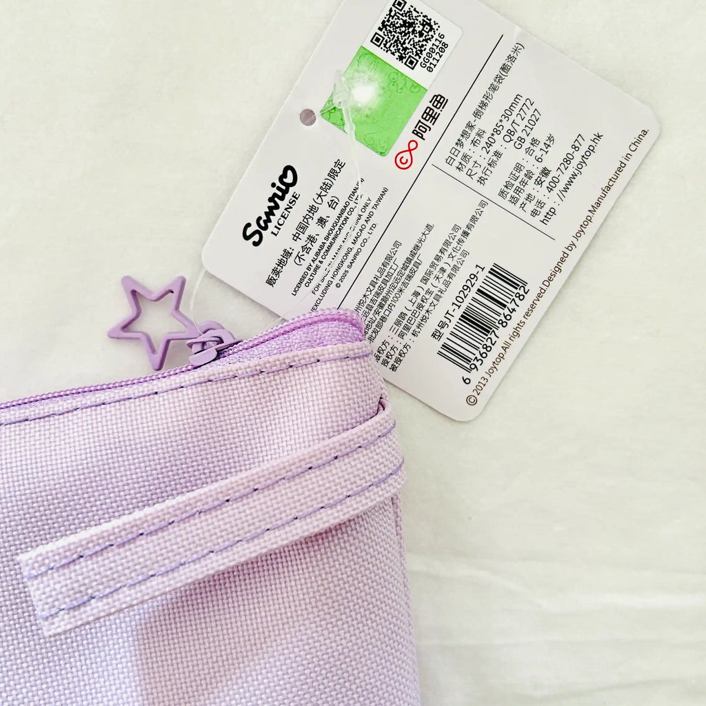 A close-up of a light purple canvas zippered pouch with a matching star-shaped zipper pull, shown next to its white product tag featuring the brand name 'Sanrio'.