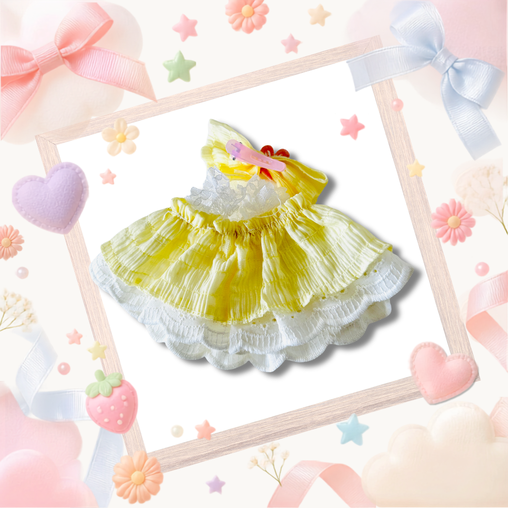 The back view of the clothing set that include yellow ruffled dress with a floral bow