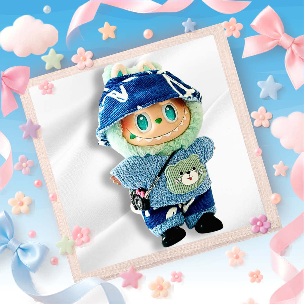 The back view of the clothing set that include blue knit sweater, bear patch, and bucket hat