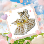A Labubu doll-sized white dress with a yellow floral print, a yellow-and-white gingham waist sash, and a matching bow headband.